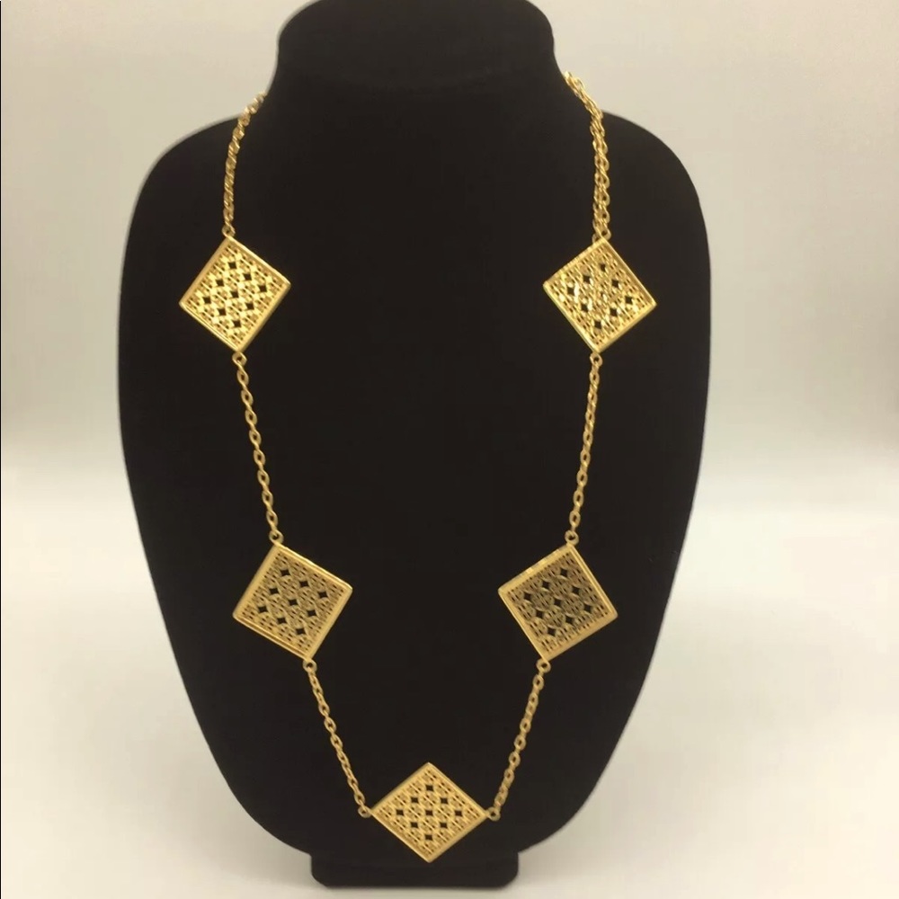 TORY BURCH PERFORATED SQUARE LOGO STATIONS 16KGP